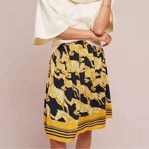 Maeve (Anthropologie) black and gold horse print skirt w button detail - sz 0​​